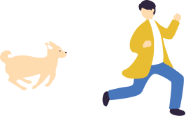犬と遊ぶ男性